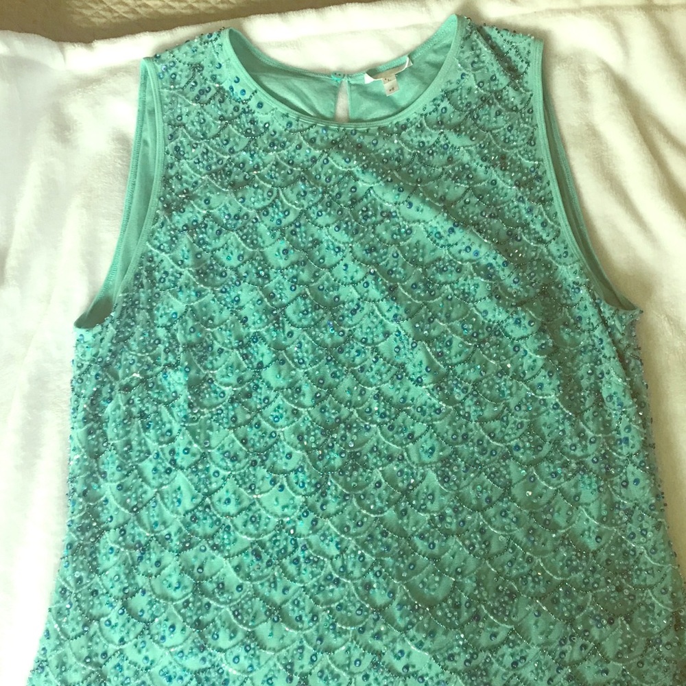 Escada Sleeveless tip with sequins and beads.